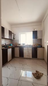 Kitchen Image of 1200 Sq.ft 2 BHK Builder Floor for rent in Sarjapur Bengaluru for Rs. 41000