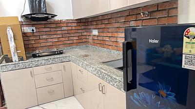 Kitchen Image of 659 Sq.ft 1 BHK Builder Floor for rent in Palam Vihar Gurgaon for Rs. 22000
