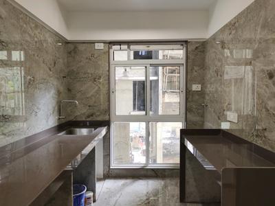 Kitchen Image of 850 Sq.ft 2 BHK Apartment / Flat for sale in Laxmi Shrushti Wing B, Goregaon West Mumbai for Rs. 17500000