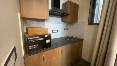 Kitchen Image of 500 Sq.ft 1 RK Builder Floor for rent in Sector 57 Gurgaon for Rs. 26000
