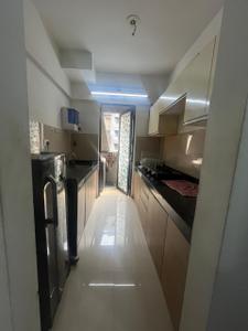 Kitchen Image of 729 Sq.ft 1 BHK Apartment / Flat for rent in Lodha Palava Downtown, Palava Phase 2 Thane for Rs. 18000