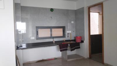 Kitchen Image of 855 Sq.ft 3 BHK Apartment / Flat for sale in Palm Glory IV, Sola Ahmedabad for Rs. 11500000
