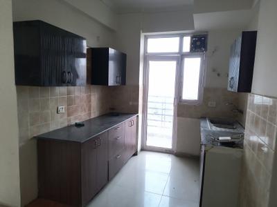 Kitchen Image of 949 Sq.ft 2 BHK Apartment / Flat for rent in Gardenia Glory, Sector 46 Noida for Rs. 30000