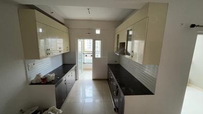Kitchen Image of 1340 Sq.ft 3 BHK Apartment / Flat for rent in Gulshan Ikebana, Sector 143 Noida for Rs. 32000