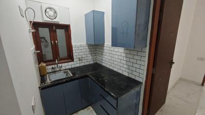 Kitchen Image of 500 Sq.ft 1 BHK Builder Floor for sale in Said-Ul-Ajaib New Delhi for Rs. 2950000