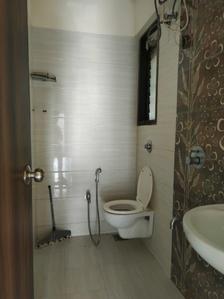 Common Bathroom Image of 950 Sq.ft 3 BHK Apartment / Flat for sale in Abhigna Avirahi Heights, Malad West Mumbai for Rs. 21800000