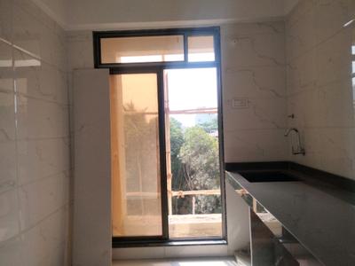Kitchen Image of 680 Sq.ft 1 BHK Apartment / Flat for sale in Om Unnati, Taloja Navi Mumbai for Rs. 3200000
