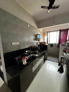 Kitchen Image of 1050 Sq.ft 1 BHK Apartment / Flat for rent in Pramukh Sahaj, Chala Vapi for Rs. 13500