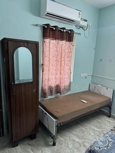 Bedroom Image of Livin Nest PG in Navalur, Chennai