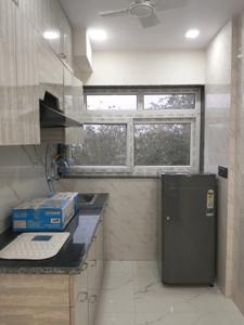 Kitchen Image of 367 Sq.ft 1 RK Apartment / Flat for rent in DLF Capital Greens, Karampura New Delhi for Rs. 24000