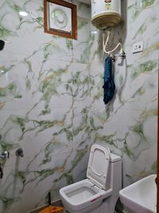 Common Bathroom Image of 630 Sq.ft 2 BHK Builder Floor for rent in Dwarka Mor New Delhi for Rs. 23500