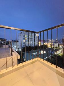 Balcony Image of 700 Sq.ft 1 BHK Apartment / Flat for rent in Domlur Layout Bengaluru for Rs. 43000