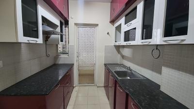 Kitchen Image of 924 Sq.ft 2 BHK Apartment / Flat for sale in DLF Woodland Heights, Bommasandra Bengaluru for Rs. 7100000