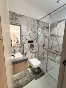 Bathroom Image of 2000 Sq.ft 4 BHK Apartment / Flat for sale in Courtyard Phoenix, Bhayli Vadodara for Rs. 13700000