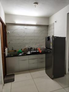 Kitchen Image of 900 Sq.ft 2 BHK Apartment / Flat for rent in Shikshapatri Sky Park, Sargasan Gandhinagar for Rs. 18500