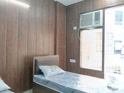 Bedroom Image of 400 Sq.ft 1 RK Builder Floor for rent in Sector 15 Gurgaon for Rs. 18000