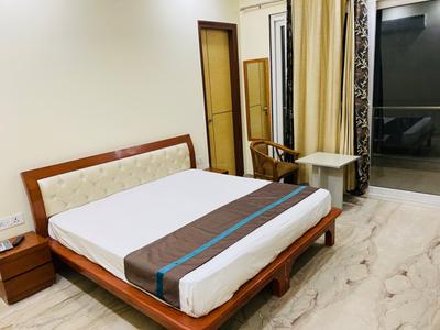 Bedroom Image of Urbanroomz Coliving PG nearby Sector 32 in Sector 31, Gurgaon
