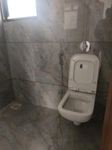 Common Bathroom Image of 1000 Sq.ft 2 BHK Apartment / Flat for sale in Kanifnath Archana Paradise, Mohammed Wadi Pune for Rs. 7300000