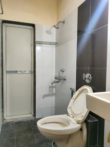 Common Bathroom Image of 600 Sq.ft 1 BHK Apartment / Flat for sale in Kasarvadavali Thane for Rs. 5200000