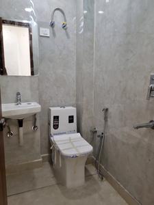 Common Bathroom Image of 550 Sq.ft 2 BHK Apartment / Flat for sale in Dwarka Mor New Delhi for Rs. 3900000