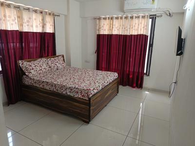 Bedroom Image of 1000 Sq.ft 2 BHK Apartment / Flat for rent in Kudasan Gandhinagar for Rs. 27000