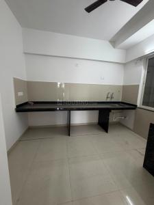 Kitchen Image of 950 Sq.ft 2 BHK Apartment / Flat for sale in Kosmic Kourtyard Phase 1, Wagholi Pune for Rs. 6200000