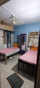 Bedroom Image of Navkar Pg in Thane West, Thane