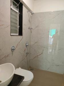 Common Bathroom Image of 596 Sq.ft 1 BHK Apartment / Flat for sale in Ashtha Pushp, Andheri East Mumbai for Rs. 14000000