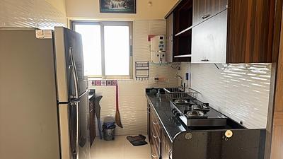 Kitchen Image of 630 Sq.ft 1 BHK Apartment / Flat for sale in Vishesh Balaji Symphony Wing I to K, Shilottar Raichur Navi Mumbai for Rs. 5800000