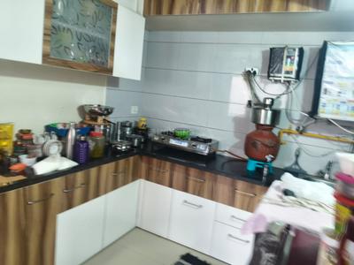 Kitchen Image of 550 Sq.ft 1 BHK Apartment / Flat for rent in Savvy Studioz, Gota Ahmedabad for Rs. 17500