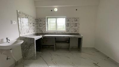 Kitchen Image of 765 Sq.ft 2 BHK Apartment / Flat for sale in New Town Kolkata for Rs. 3600000