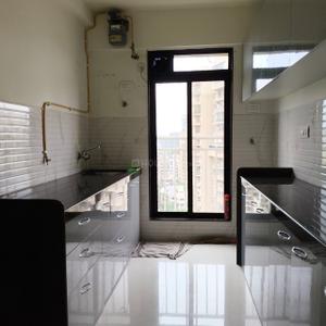 Kitchen Image of 670 Sq.ft 2 BHK Apartment / Flat for rent in Oxford Navrang Crystal, Goregaon West Mumbai for Rs. 60000