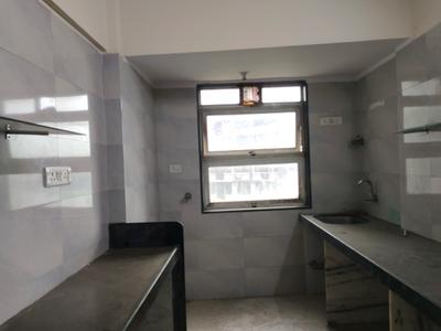 Kitchen Image of 850 Sq.ft 2 BHK Apartment / Flat for sale in Rajendra Dolphin Tower, Malad West Mumbai for Rs. 13900000