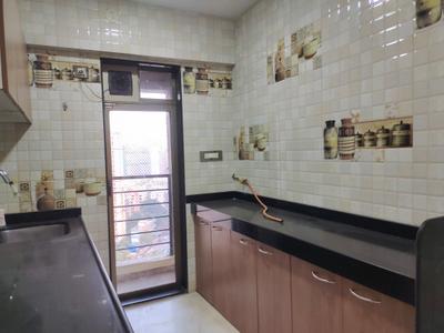 Kitchen Image of 850 Sq.ft 2 BHK Apartment / Flat for sale in Dhaval Sunrise Charkop, Kandivali West Mumbai for Rs. 16000000
