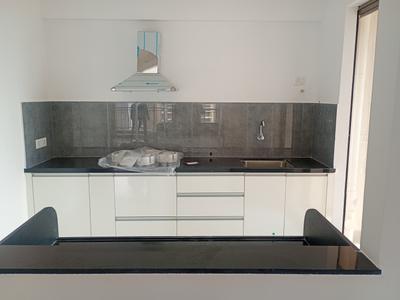 Kitchen Image of 910 Sq.ft 2 BHK Apartment / Flat for sale in Wellington at Pride World City, Charholi Budruk Pune for Rs. 8600000