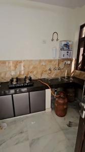 Kitchen Image of 1100 Sq.ft 2 BHK Builder Floor for rent in Rajouri Garden New Delhi for Rs. 31000