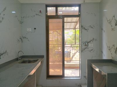 Kitchen Image of 640 Sq.ft 1 BHK Apartment / Flat for sale in Dynamic Crest Phase I Rimo Everest, Khidkali Thane for Rs. 3700000