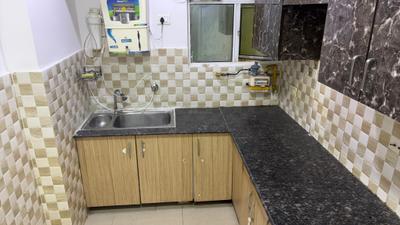 Kitchen Image of 820 Sq.ft 2 BHK Apartment / Flat for rent in Gaur City 2 16th Avenue, Noida Extension Greater Noida for Rs. 18000