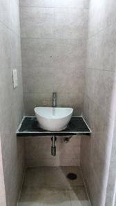 Bathroom Image of 660 Sq.ft 1 BHK Apartment / Flat for sale in Vishesh Balaji Symphony, Shilottar Raichur Navi Mumbai for Rs. 4800000