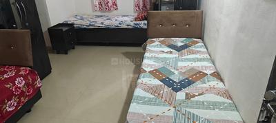 Bedroom Image of Om Sai PG in Ghorpadi, Pune