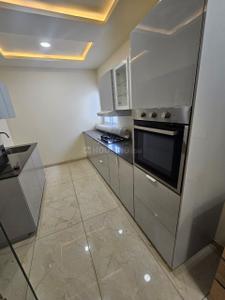 Kitchen Image of 1945 Sq.ft 3 BHK Duplex for sale in SBR Florenso, K R Puram Bengaluru for Rs. 19500000