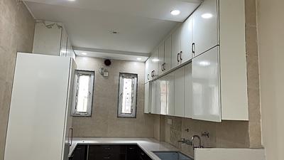 Kitchen Image of 1050 Sq.ft 3 BHK Builder Floor for rent in Sector 7 Rohini New Delhi for Rs. 37000