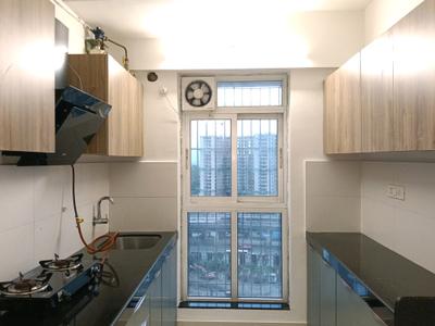Kitchen Image of 700 Sq.ft 1.5 BHK Apartment / Flat for rent in Godrej Emerald, Kasarvadavali Thane for Rs. 27199