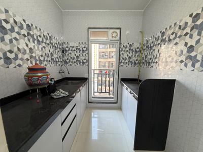 Kitchen Image of 550 Sq.ft 1 BHK Apartment / Flat for sale in Raunak Bliss Phase A, Kasarvadavali Thane for Rs. 5500000
