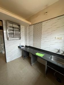 Kitchen Image of 700 Sq.ft 1 BHK Apartment / Flat for sale in Mohan Willows I, Badlapur East Badlapur for Rs. 2750000