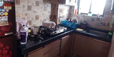 Kitchen Image of 877 Sq.ft 2 BHK Apartment / Flat for sale in Jai Balaji Krishna Kanha Appartment, Tollygunge Kolkata for Rs. 8500000