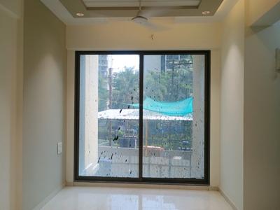 Living Room Image of 690 Sq.ft 1 BHK Apartment / Flat for rent in Tharwani Rosalie, Kalyan West Kalyan for Rs. 18500