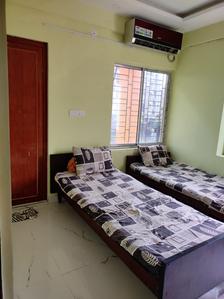 Bedroom Image of NESTUP PG in New Town, Kolkata