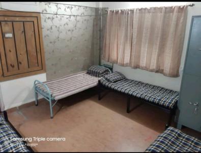 Bedroom Image of  Moksh PG in Kothrud, Pune