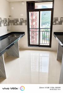 Kitchen Image of 1025 Sq.ft 2 BHK Apartment / Flat for sale in National Trinity Paradise Phase 1, Shilphata Thane for Rs. 7500000